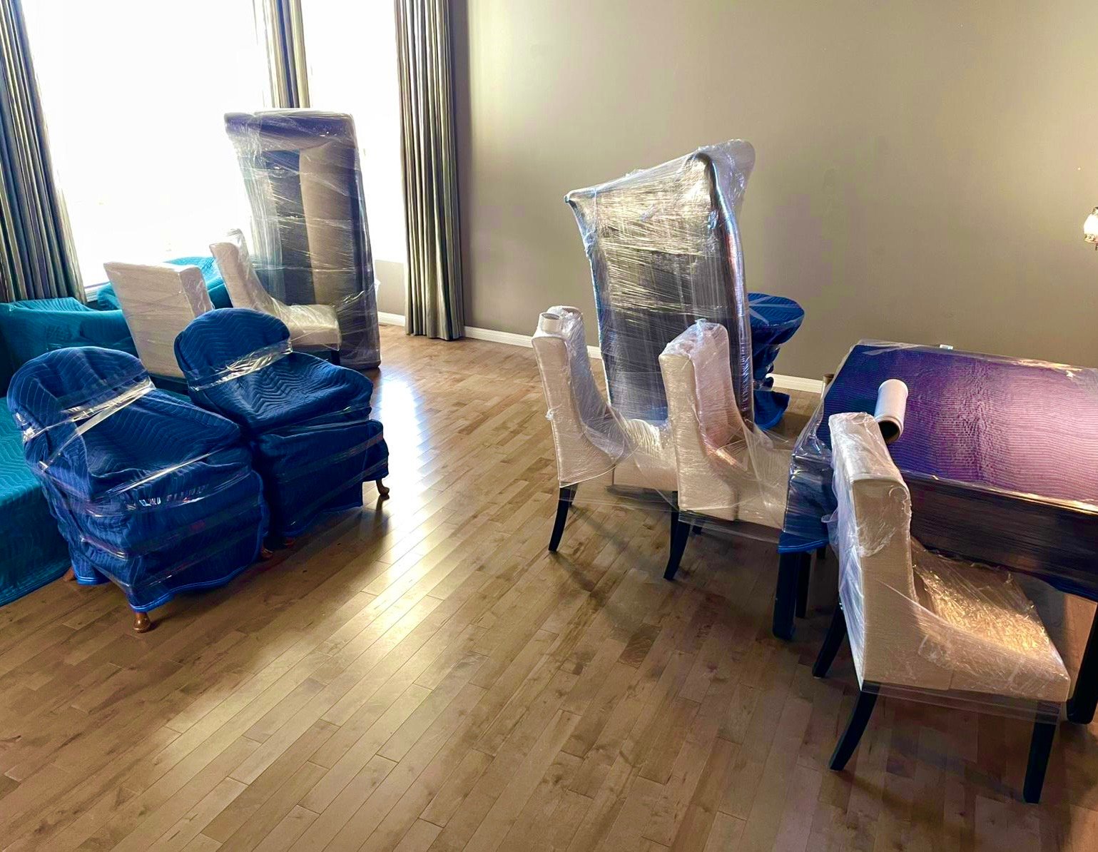 Movers Calgary crew working carefully loading items